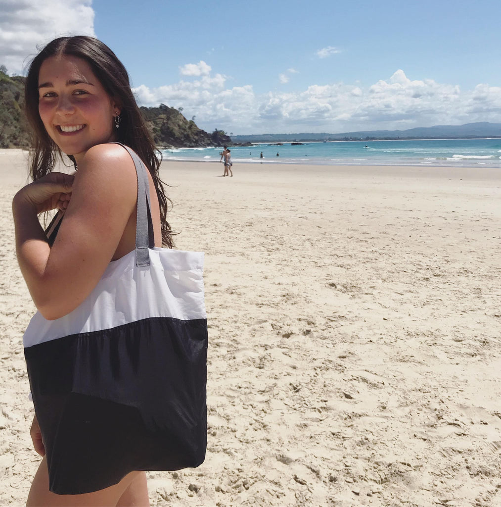 Hit the beach with your flip & tumble Tote Bag!